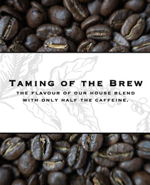 Image describing taming of the brew our half caffeine house blend 
